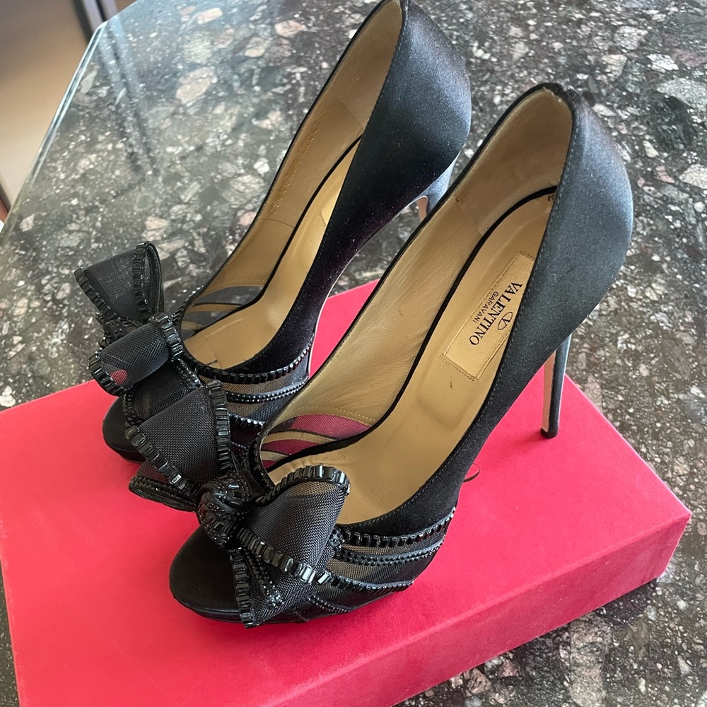 Black satin Valentino heels with sequins.
